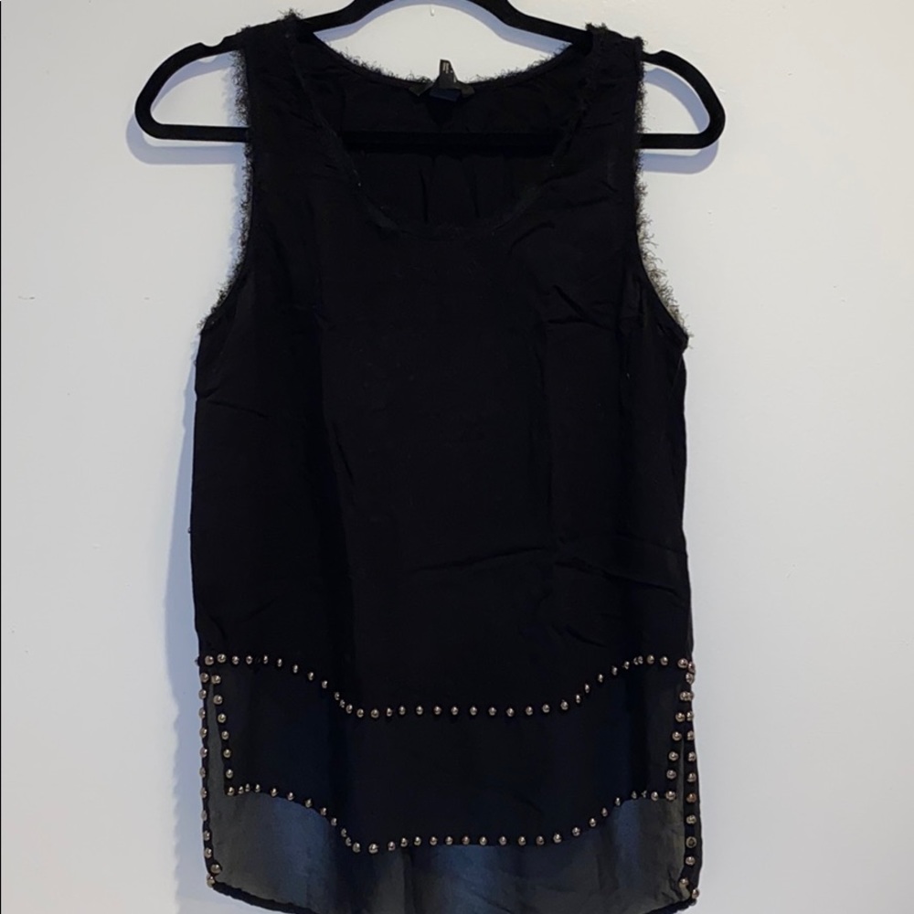 Black going out top